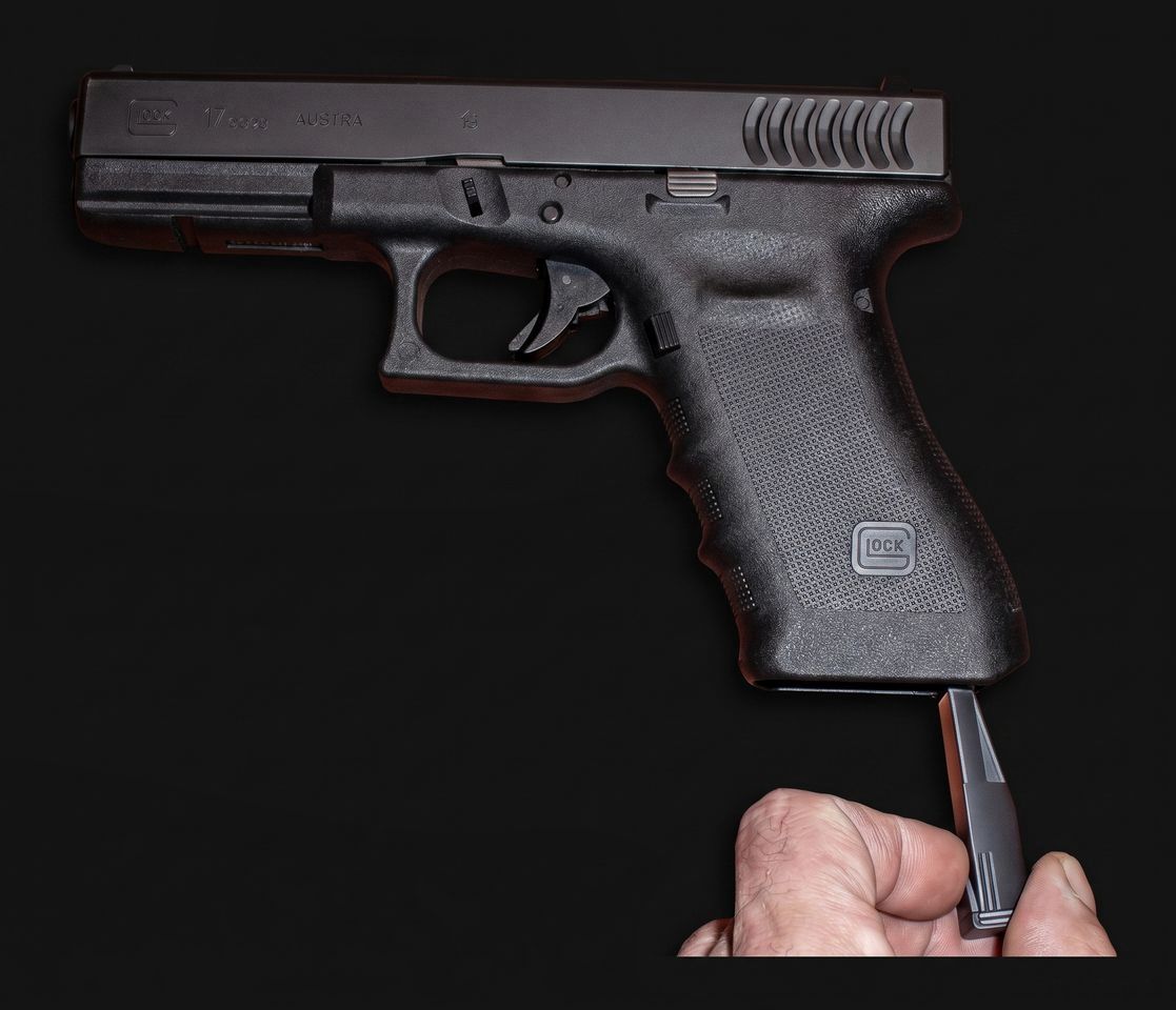 RuBee tag being fitted into a pistol grip