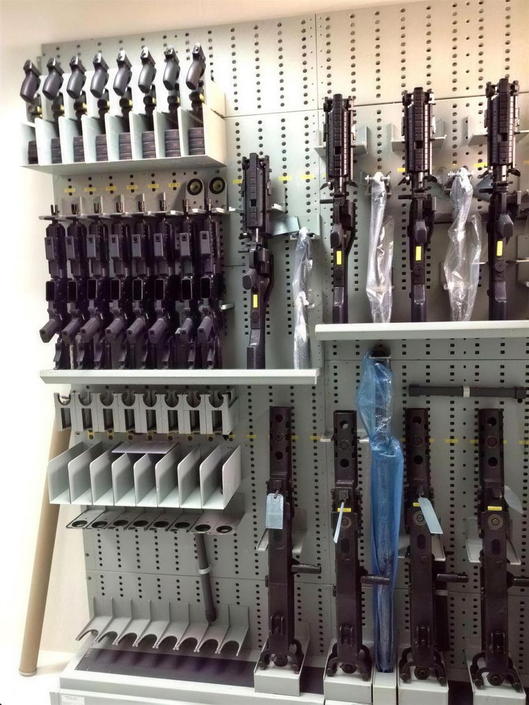 Weapons on RuBee-enabled racks at a customer site