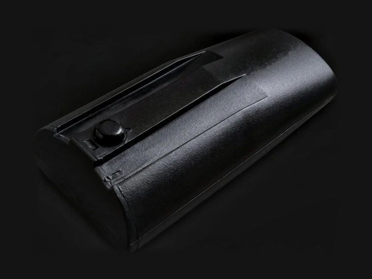 Glock pistol with RuBee tag fitted in the grip